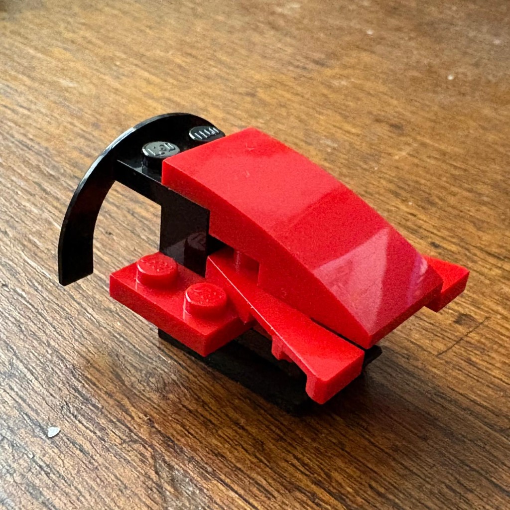LEGO supergrasmaaier — een supersnelle grasmaaier met blauwe vliegtuigvorm